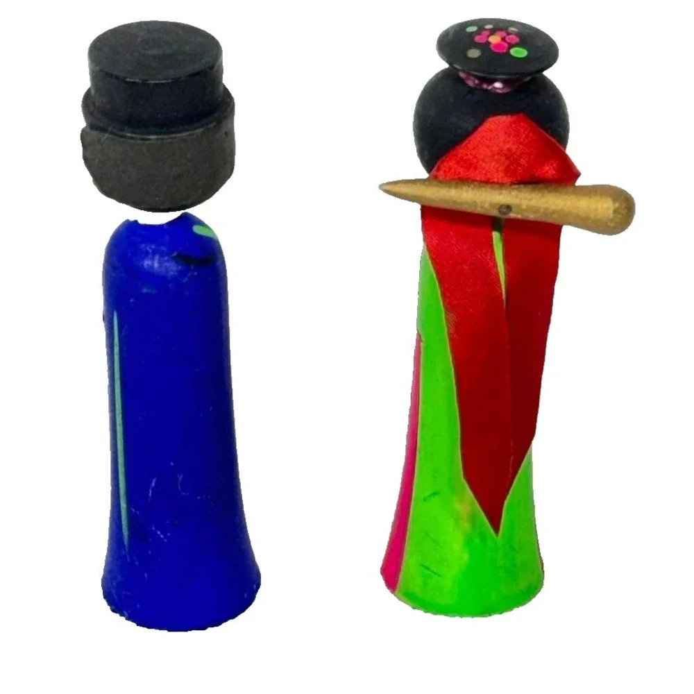Handmade‎ wooden Kokeshi dolls with colorful designs